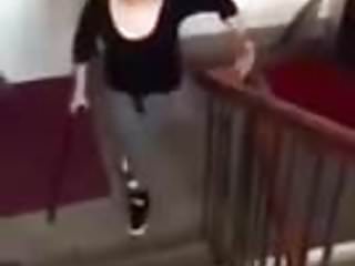 Amputee Girl Up Stairs With One Crutch