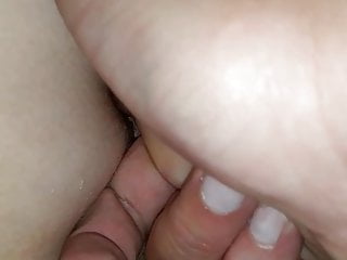 My finger in her hairy asshole