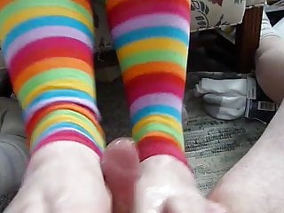 Footjob with rainbow leggings 