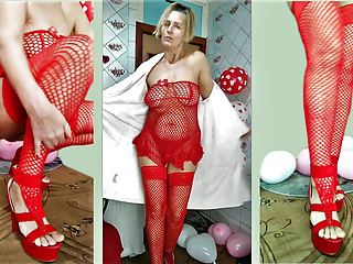 Sexy Lukerya in red between heart-shaped balloons for Valentine&#039;s Day flirts with fans in red high-heeled shoes on webca