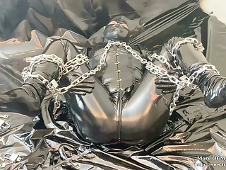  video: Shiny bodysuit chain bondage