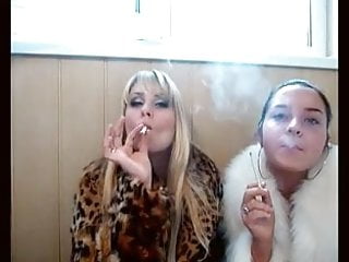 2 Russian Babes In Furs Smoking Not Inhaling...