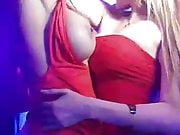 Two beautiful lesbian bimbos teasing each other at party bus