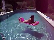 topless girlfriend in pool dancing