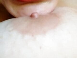 Me licking my milky nipples...