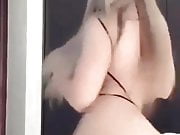 Blonde girl with big booty dancing under Despacito