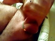 Stroking my cock with ring on 