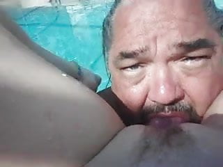 eating a fresh shaved pussy pool side