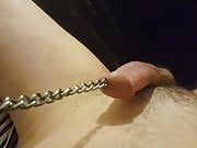 Guy pulling chain out his urethra