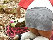 MILF masturbates with dildo in forest. Red Hood, knee highs