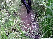 Sexy thigh boots in another mud pit!