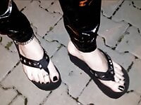 Crossdresser on a public street in latex leggings and exciting platform flip flops | Tranny Update