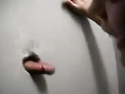 Mature woman at the glory hole sucking cock for cum 