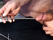 Multiple objects in cock. Extreme urethral sounding + cum. Hard oiled cock stuffed full.