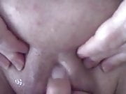Rubbing her clit...
