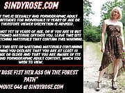 Sindy Rose fist her ass on the forest path