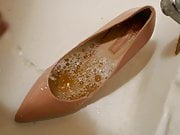 Piss in pink stiletto high heel