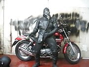 leather and rubber masked motorcycle wank