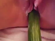Amateur masturbate with cucumber while watching porn