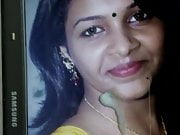 cumming on Saranya Nag yellow blouse and face