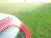Footjob near a car