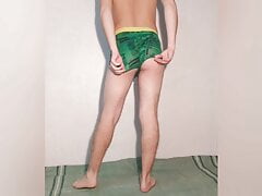 Hot guy tries on green boxers and poses sexy in them