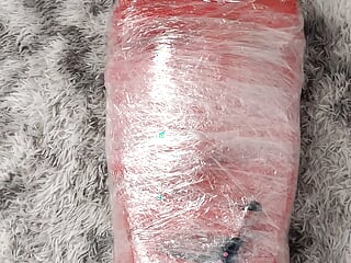 NANA Mummified with red plastic tape and then played with for orgasms