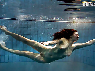 Hot babe swims sea mermaid...