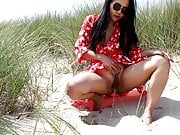 Asian Girl Pissing on the Beach