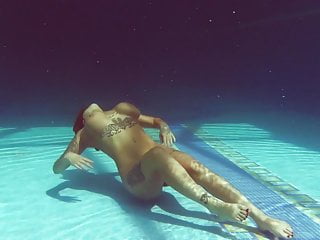 Heidi Van Horny with huge tits underwater