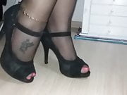 black pantyhose + sandals + tease