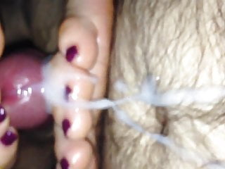 Purple nail polish and footjob.