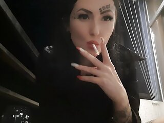 Smoking fetish from the charming Dominatrix Nika. You will swallow her cigarette smoke and ashes