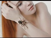 brave nude woman with spider 