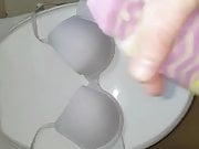 Sock handjob cum on bra