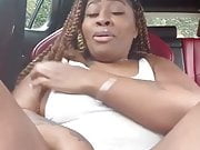 Ebony masturbating in a car