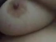 Wife playing with her hard nipples